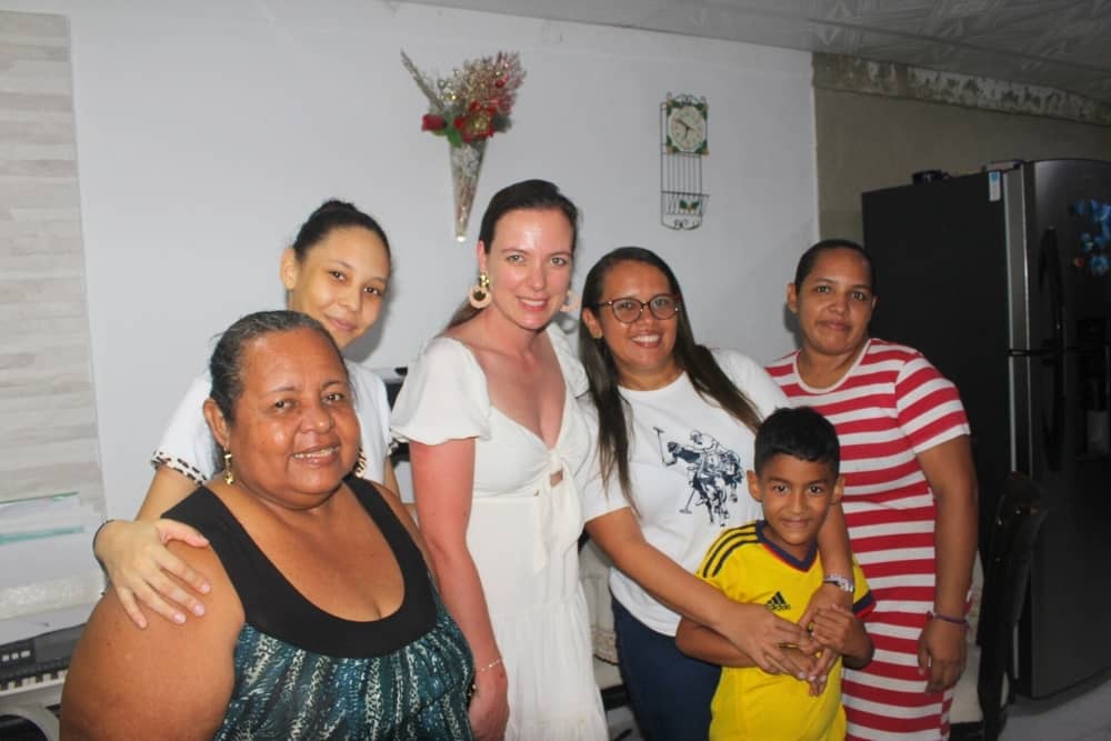 cartagena family rebecca as a traveler enjoying dinner with local family in cartagena.