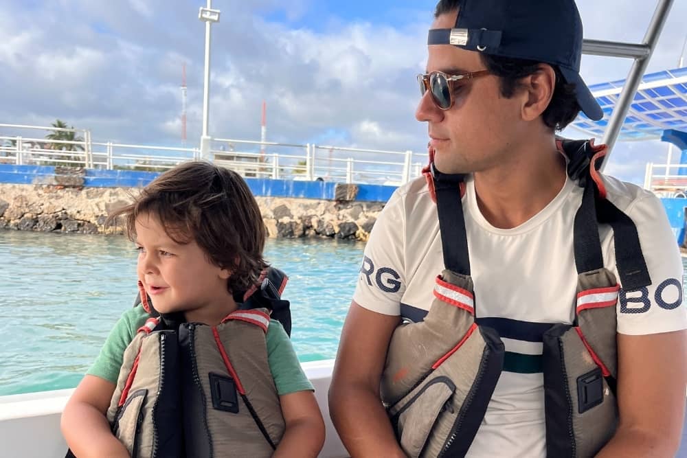 infant and father at boat rebecca kids