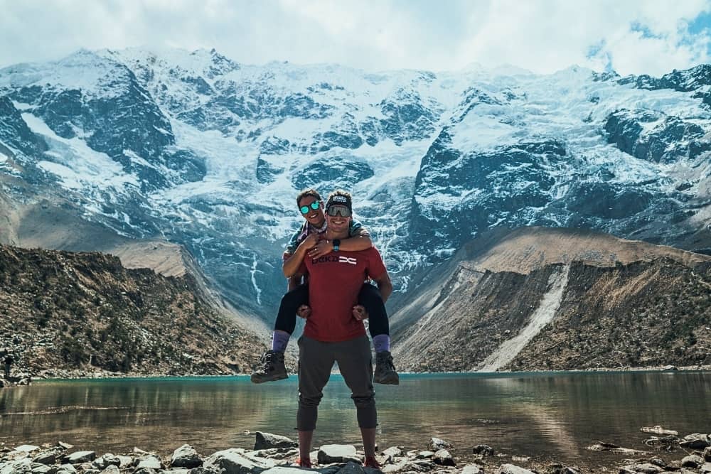 torres del paine 1 travelers reaching lake at the mountains. - camping