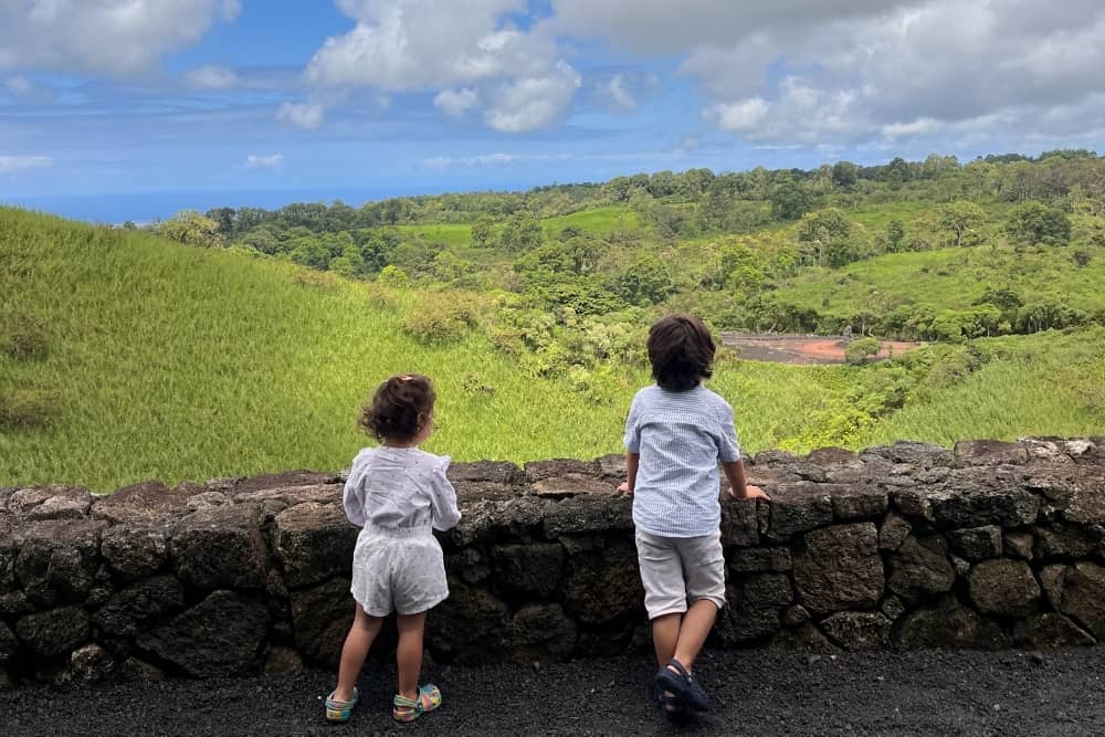 view of santa cruz kids watching the views of galapagos from the hotel.